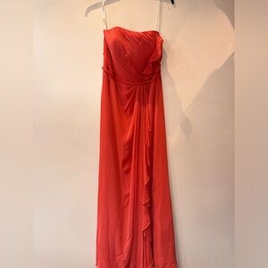 Bary Jay salmon color strapless formal length gown. Size 12 but tag removed.